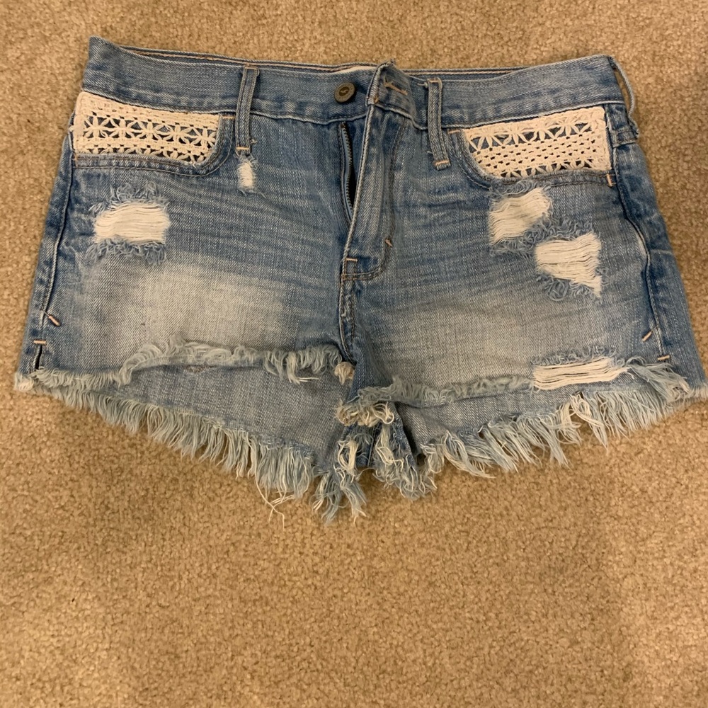Hollister Jean shorts with lace pocket accents
